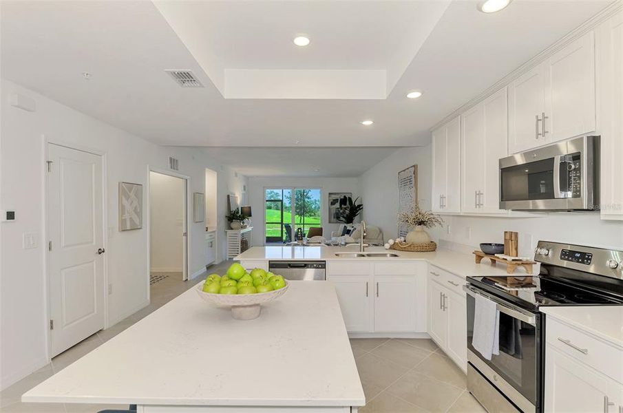 Furnished interior view inside a new home in Wellen Park Golf & Country Club, Venice (Image 45).
