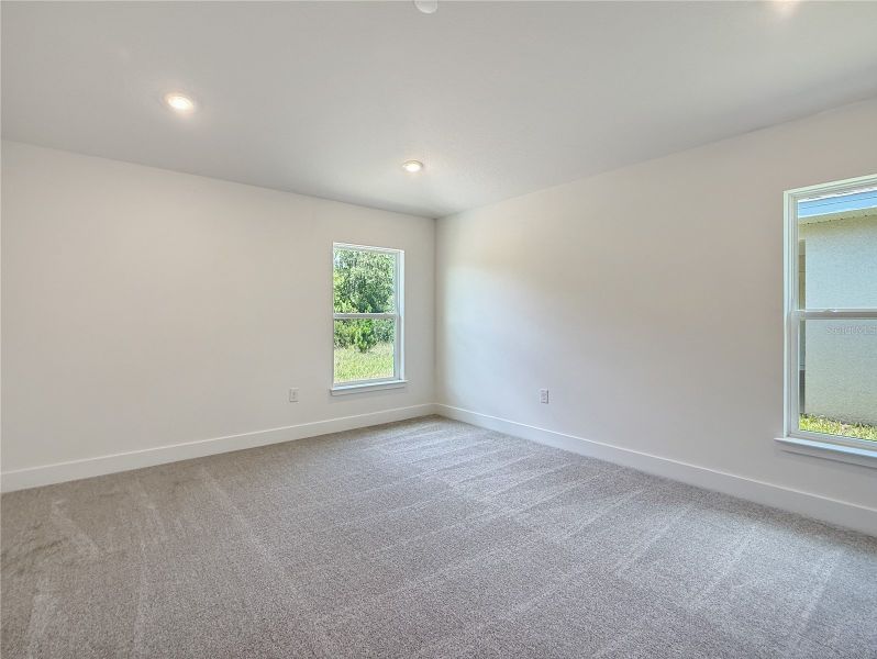 Spacious, unfurnished interior of a new home in Harmony Central, St. Cloud (Image 12).