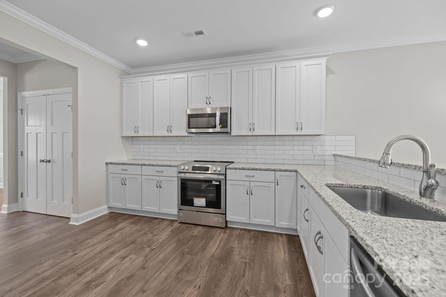 Furnished interior view inside a new home in , Monroe (Image 7).