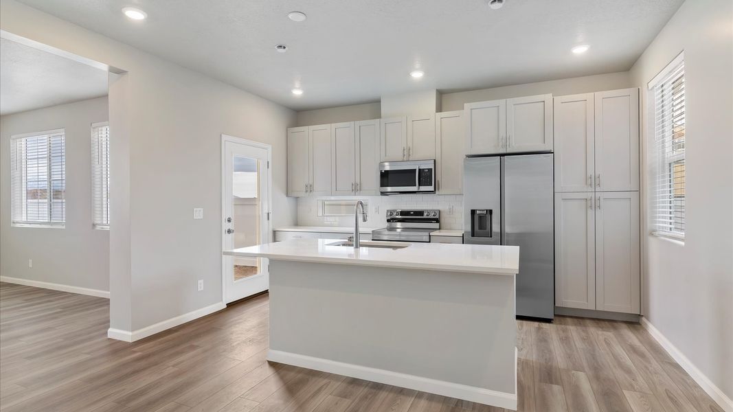 Furnished interior view inside a new home in Reunion, Commerce City (Image 7).