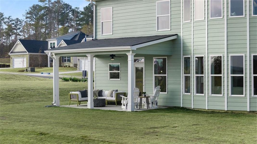 Exterior details and patio area of a home in Evergreen Crossing, Locust Grove (Image 24). Exterior details and patio area of a home in Evergreen Crossing, Locust Grove (Image 24).