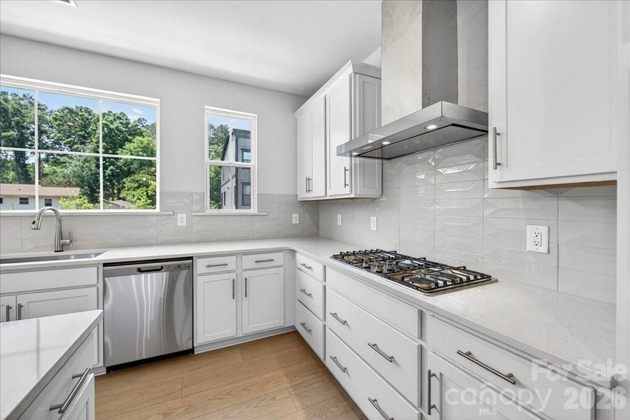 Gourmet kitchen with gas cooktop Gourmet kitchen with gas cooktop