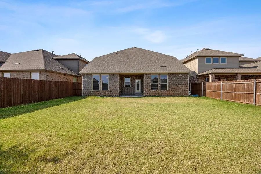 Exterior details and patio area of a home in , Aubrey (Image 4).