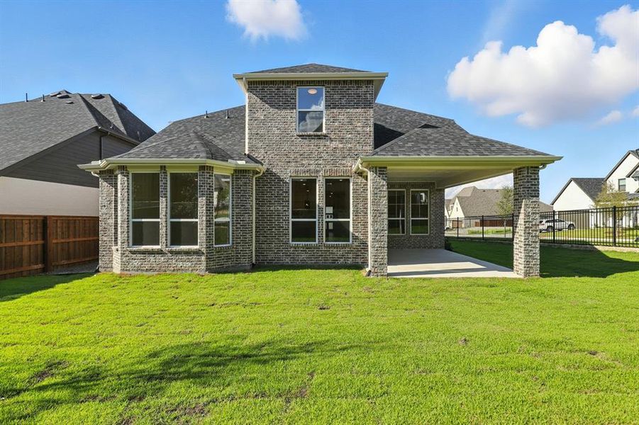 Front exterior of a new home in Walsh: Artisan Series - 50' lots, Aledo, TX, highlighting curb appeal (Image 2).