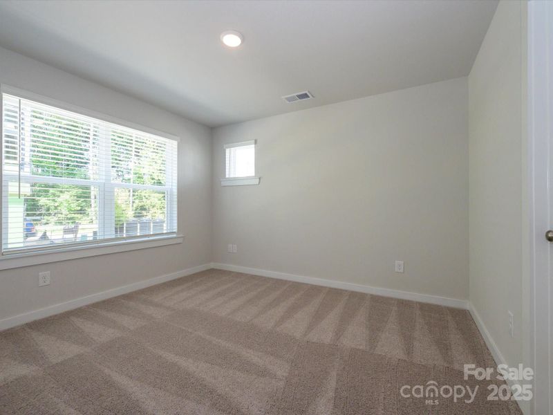 Spacious, unfurnished interior of a new home in Central Living at Craig, Charlotte (Image 13).