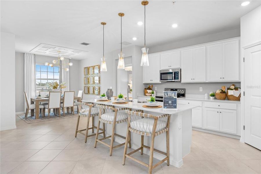 Furnished interior view inside a new home in Wellen Park Golf & Country Club, Venice (Image 15).