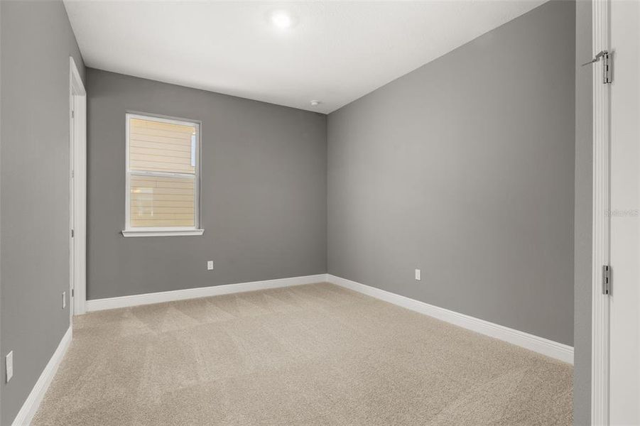Spacious, unfurnished interior of a new home in Green Key Village, Lady Lake (Image 23).