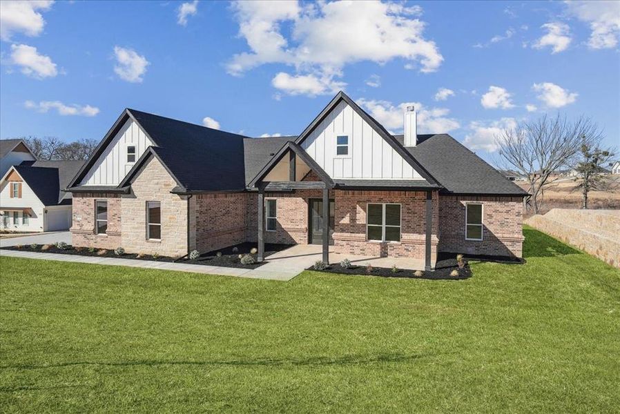 Front exterior of a new home in , Azle, TX, highlighting curb appeal (Image 27).