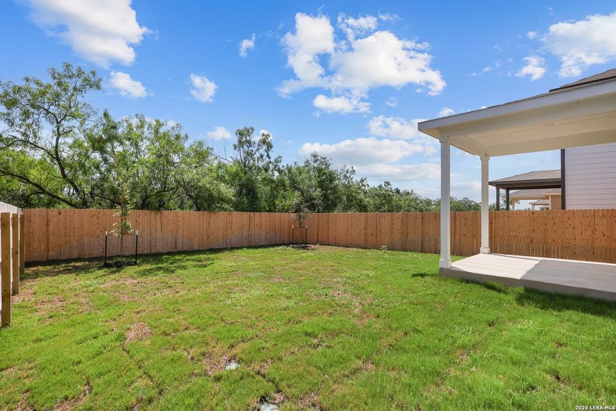Exterior details and patio area of a home in Hacienda, San Antonio (Image 3).