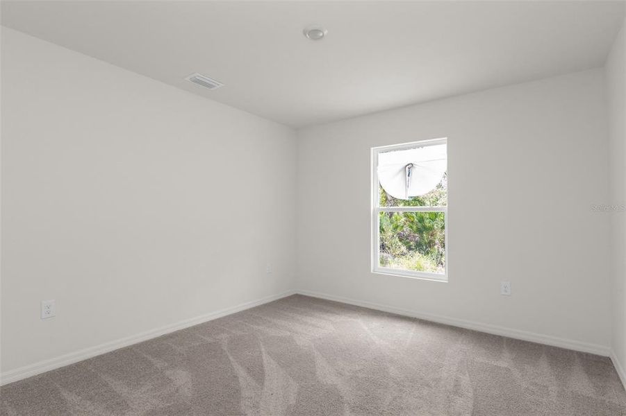 Spacious, unfurnished interior of a new home in , Port Charlotte (Image 22).