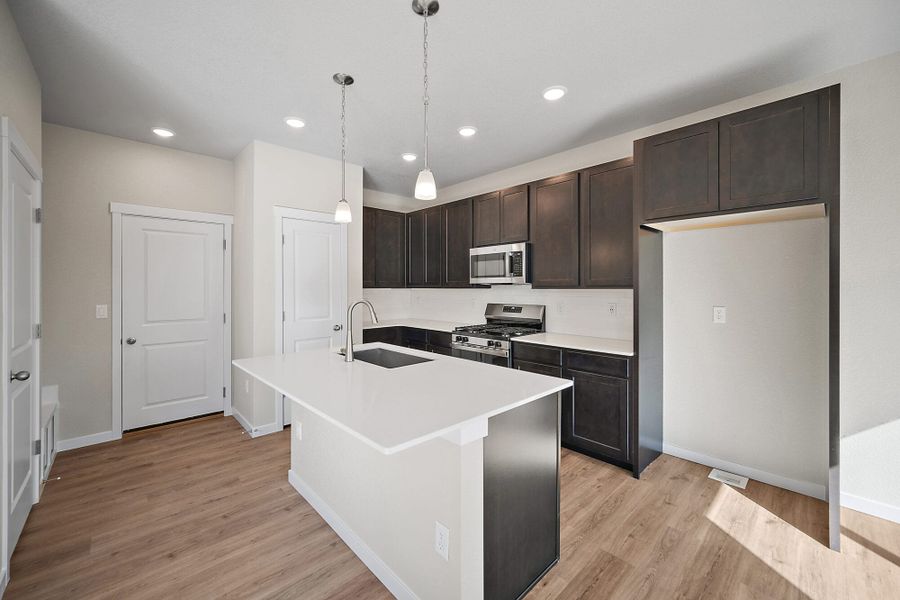Furnished interior view inside a new home in Ridge at Lorson Ranch, Colorado Springs (Image 9).