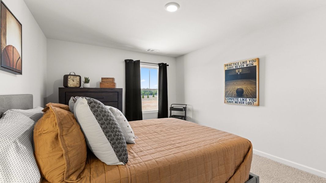 Representative furnished interior of a home built from the Elston by D.R. Horton in Rolling Meadows, Jasper (Image 34).