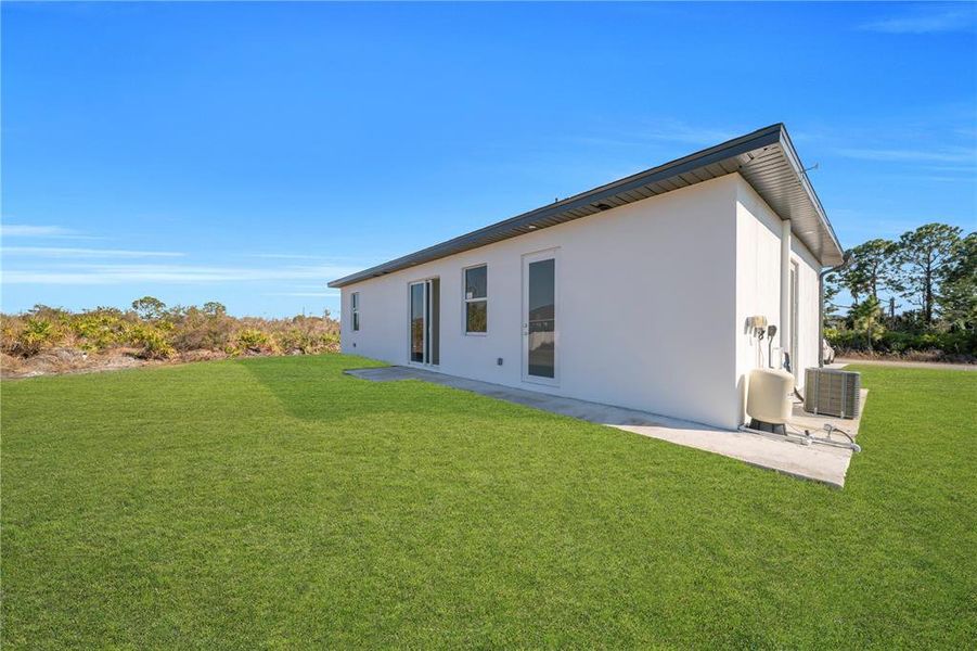 Exterior details and patio area of a home in , Lehigh Acres (Image 3).