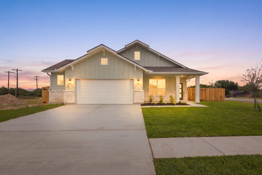 Front exterior of a new home in TerraVista, Victoria, TX, highlighting curb appeal (Image 1). Front exterior of a new home in TerraVista, Victoria, TX, highlighting curb appeal (Image 1).