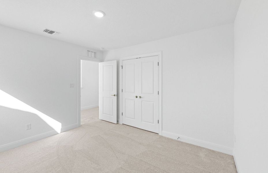 Spacious, unfurnished interior of a new home in Saddleback at Santa Rita Ranch, Liberty Hill (Image 32).