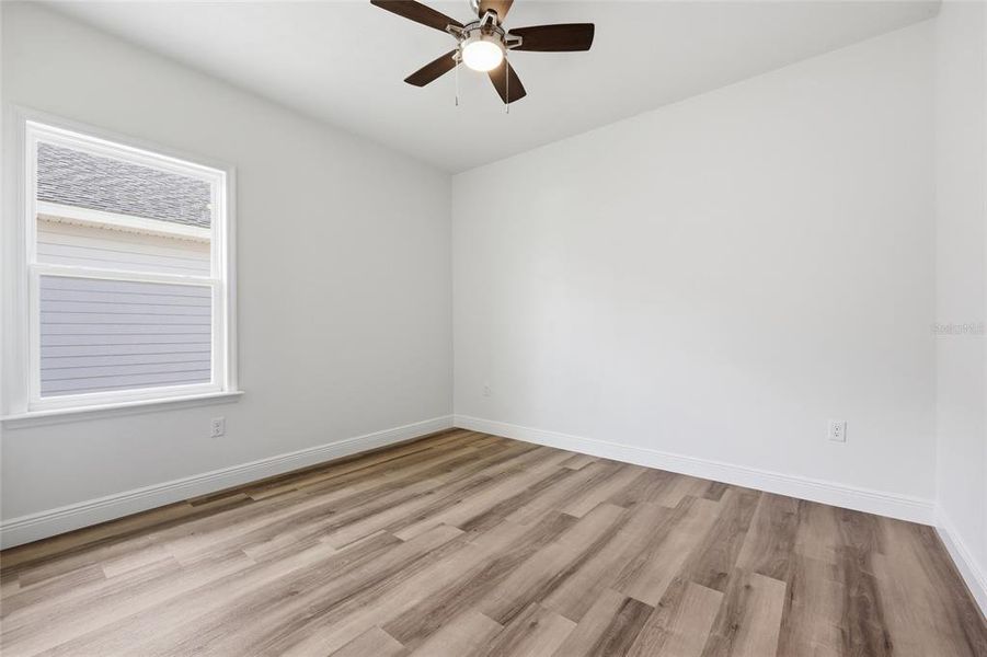 Spacious, unfurnished interior of a new home in Grand Oaks, Gainesville (Image 21).