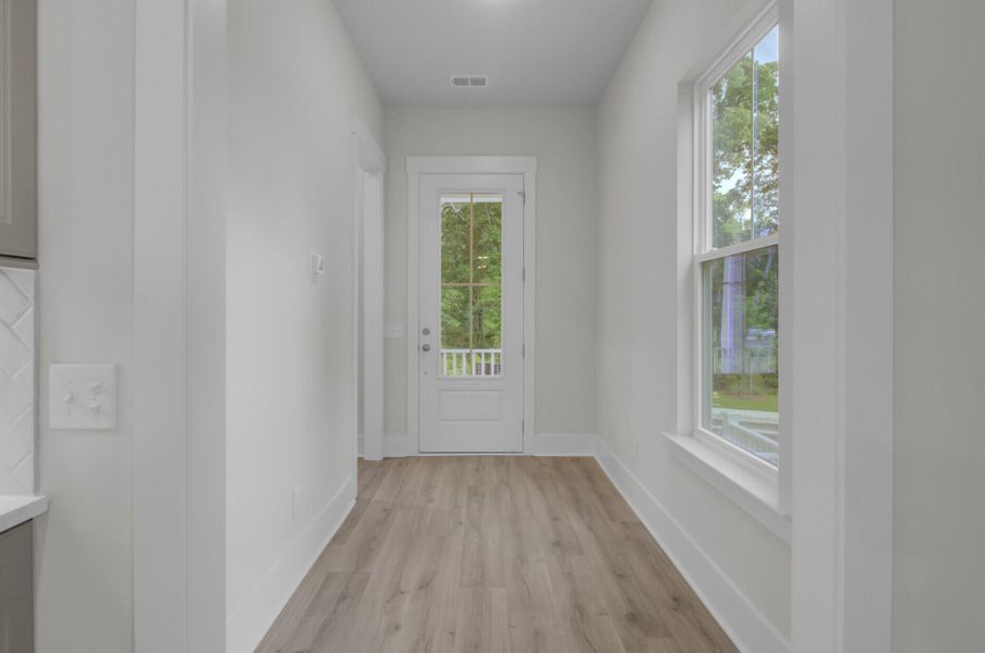 Spacious, unfurnished interior of a new home in Indigo Grove Single Family Homes, Johns Island (Image 50).