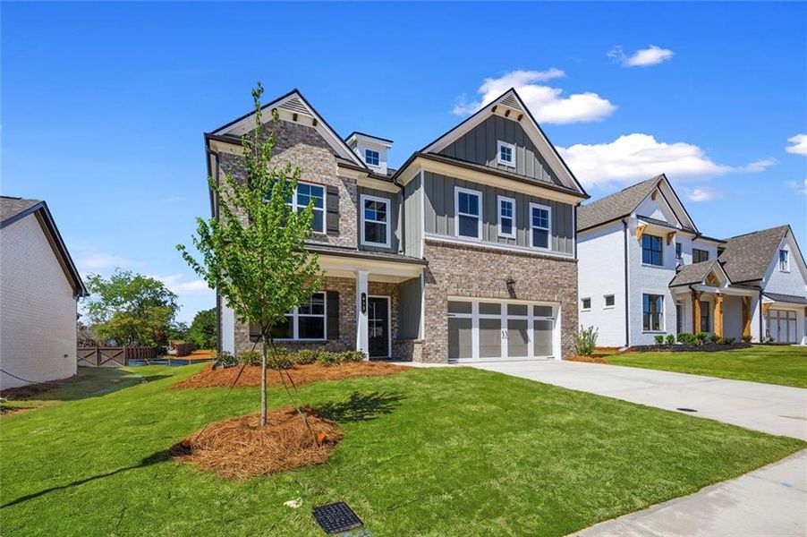 Front exterior of a new home in Greenefield, Cartersville, GA, highlighting curb appeal (Image 2). Front exterior of a new home in Greenefield, Cartersville, GA, highlighting curb appeal (Image 2).