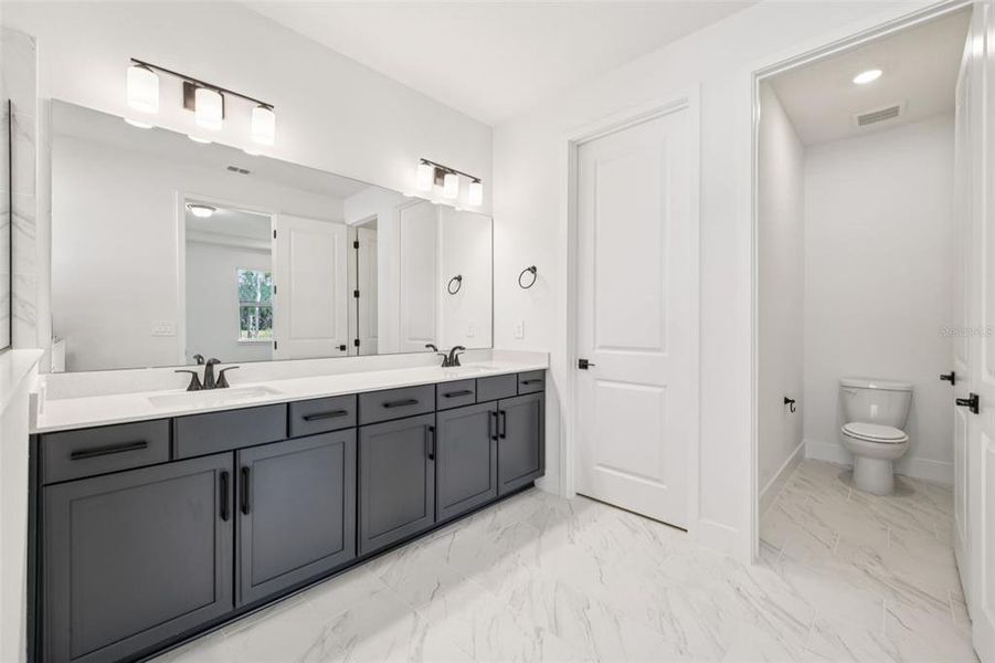 Furnished interior view inside a new home in Ridgehaven - Reserve Series, Ormond Beach (Image 14).