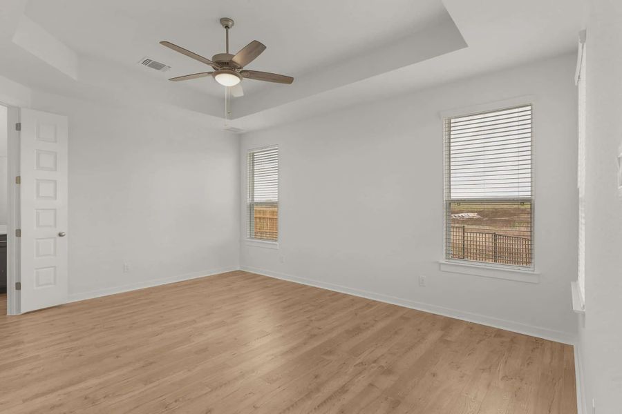 Spacious, unfurnished interior of a new home in The Grove at Blackhawk, Pflugerville (Image 9).