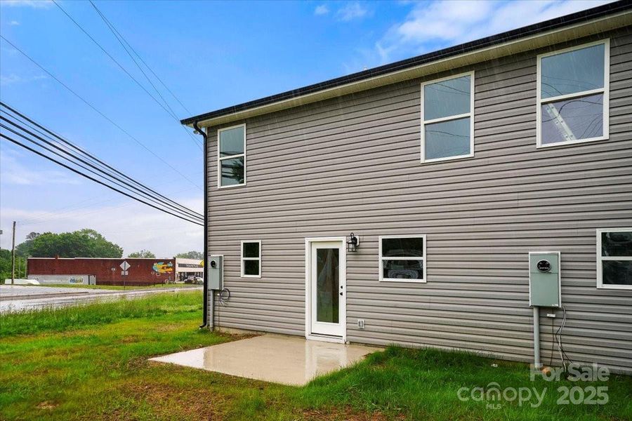 Front exterior of a new home in , Albemarle, NC, highlighting curb appeal (Image 20).