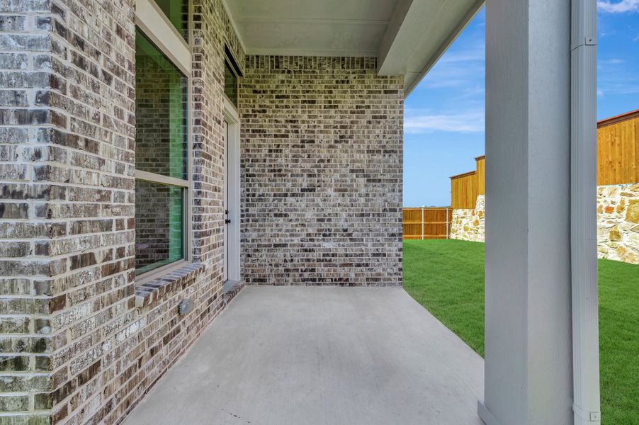 Exterior details and patio area of a home in Monterra - Gardens, Fate (Image 3).