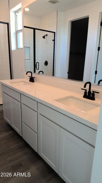 Double vanity at masterbath with quartz