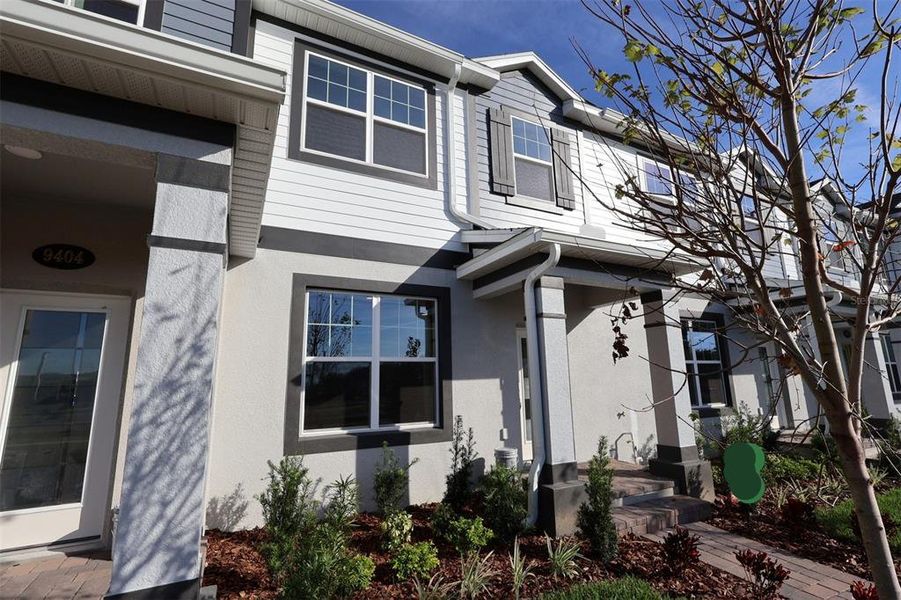 Exterior details and patio area of a home in Tribute at Ovation, Winter Garden (Image 27). Exterior details and patio area of a home in Tribute at Ovation, Winter Garden (Image 27).
