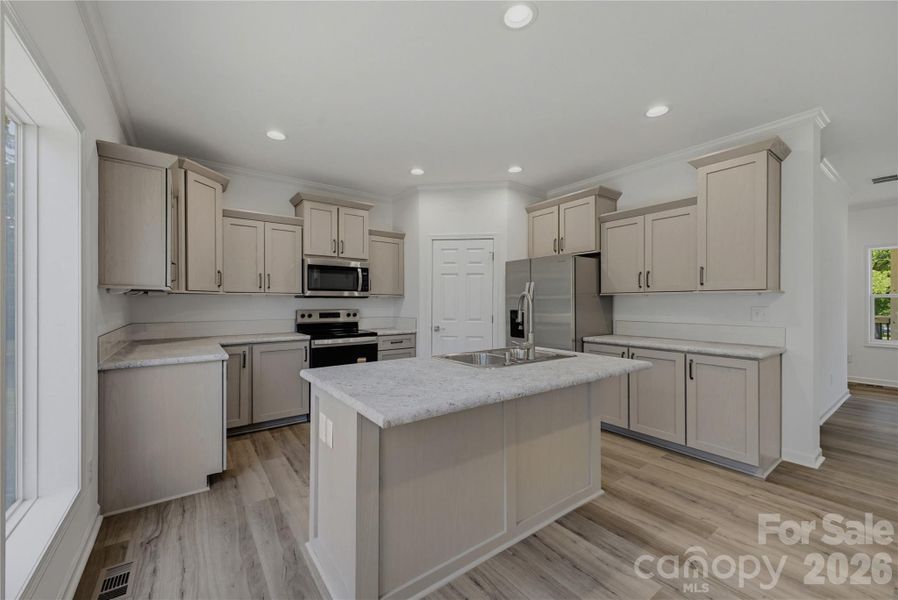Furnished interior view inside a new home in , Newton (Image 8).