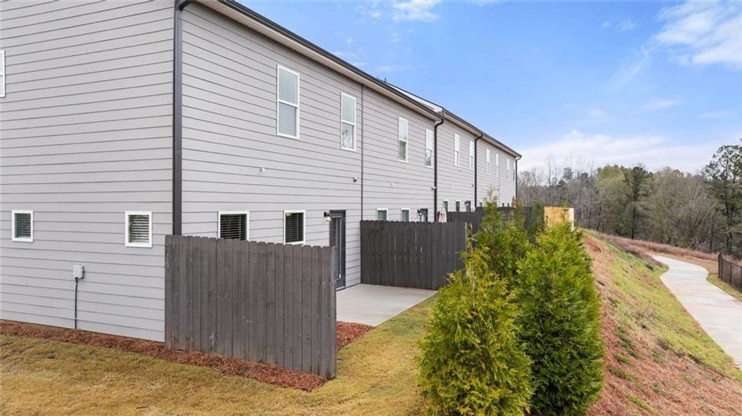 Exterior details and patio area of a home in Reeves Park, Stockbridge (Image 30).
