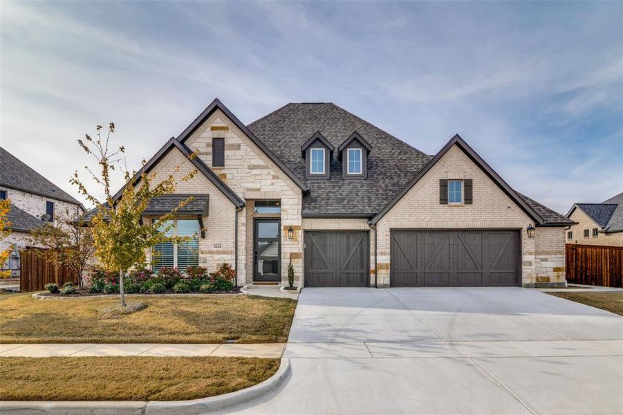 Welcome home! Stunning curb appeal with the brick and stone combination. 3 car garage. Welcome home! Stunning curb appeal with the brick and stone combination. 3 car garage.