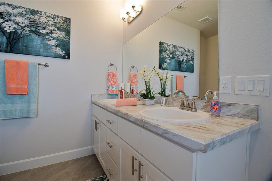Furnished interior view inside a new home in Rolling Hills, Bell (Image 8).