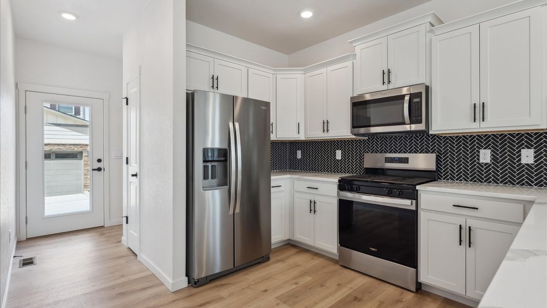 Representative furnished interior of a home built from the Alamosa by D.R. Horton in Sky Ranch, Watkins (Image 7). Representative furnished interior of a home built from the Alamosa by D.R. Horton in Sky Ranch, Watkins (Image 7).