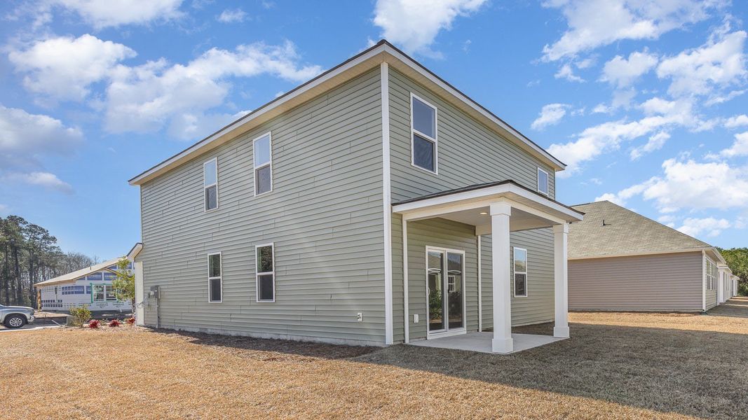 Exterior details and patio area of a home in Sandridge Park, Little River (Image 3).