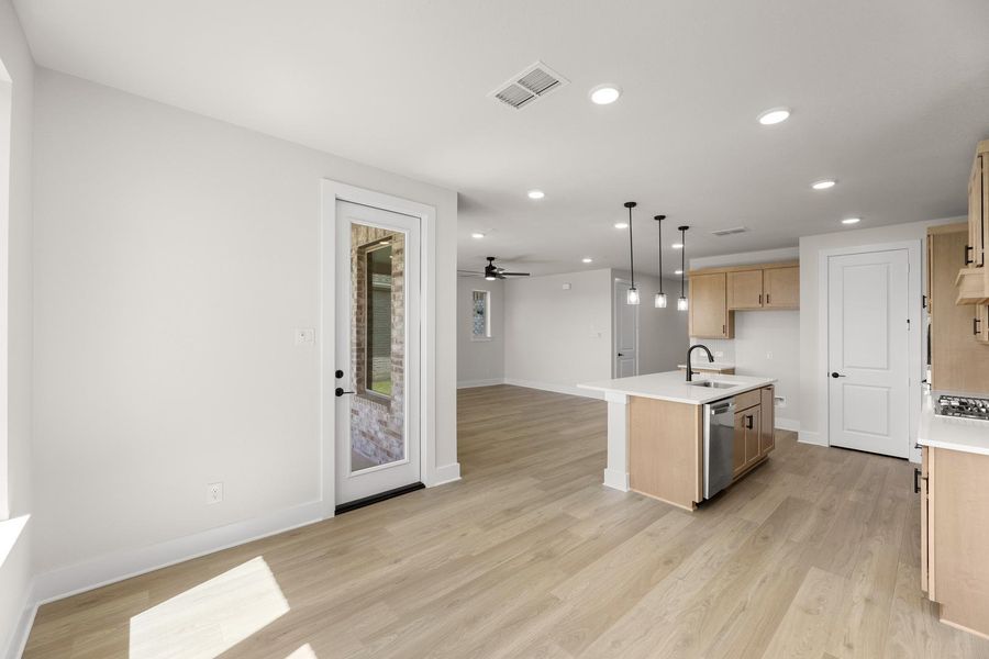 Furnished interior view inside a new home in Union Park, Little Elm (Image 9).
