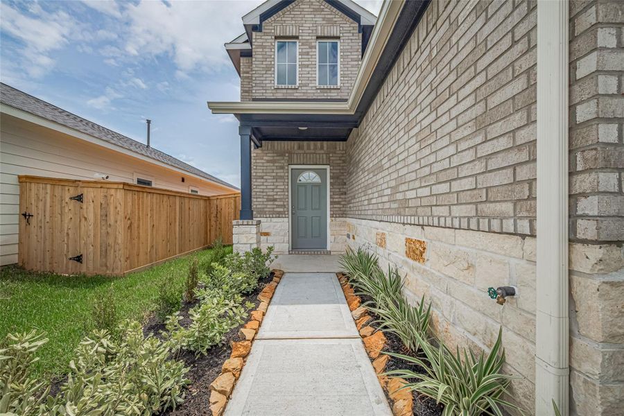 Exterior details and patio area of a home in La Segarra, Brookshire (Image 4). Exterior details and patio area of a home in La Segarra, Brookshire (Image 4).
