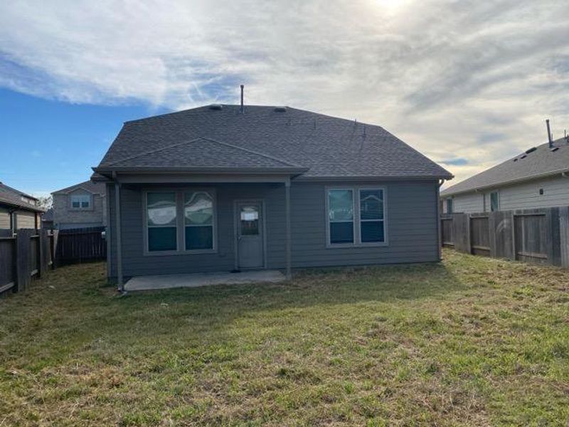Exterior details and patio area of a home in Myrtle Gardens, Magnolia (Image 3). Exterior details and patio area of a home in Myrtle Gardens, Magnolia (Image 3).