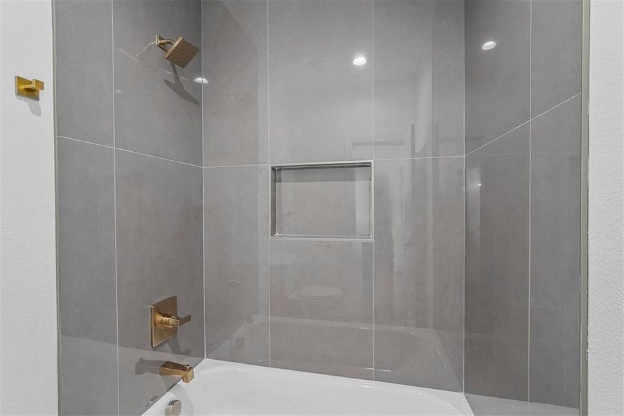 Full bathroom with shower / washtub combination Full bathroom with shower / washtub combination