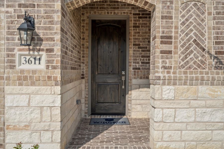 Representative exterior details of a home built from the Frio by Windsor Homes in Villas at Long Branch, Rowlett (Image 2). Representative exterior details of a home built from the Frio by Windsor Homes in Villas at Long Branch, Rowlett (Image 2).