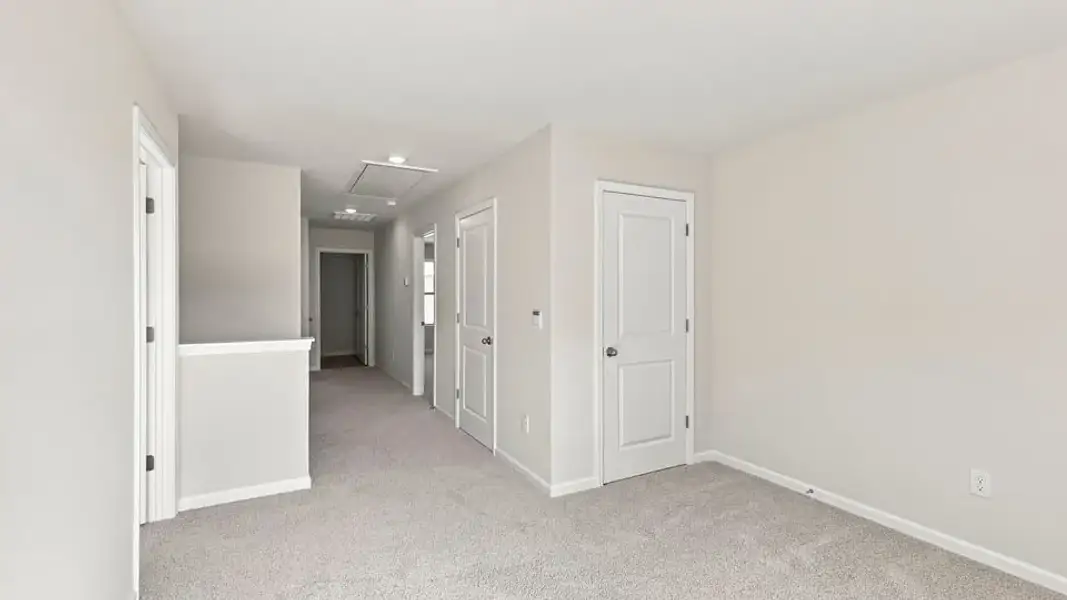 Spacious, unfurnished interior of a new home in Rocky River Ridge, Anderson (Image 22).