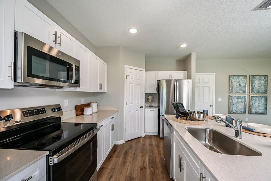 Furnished interior view inside a new home in Scenic Terrace, Haines City (Image 5).