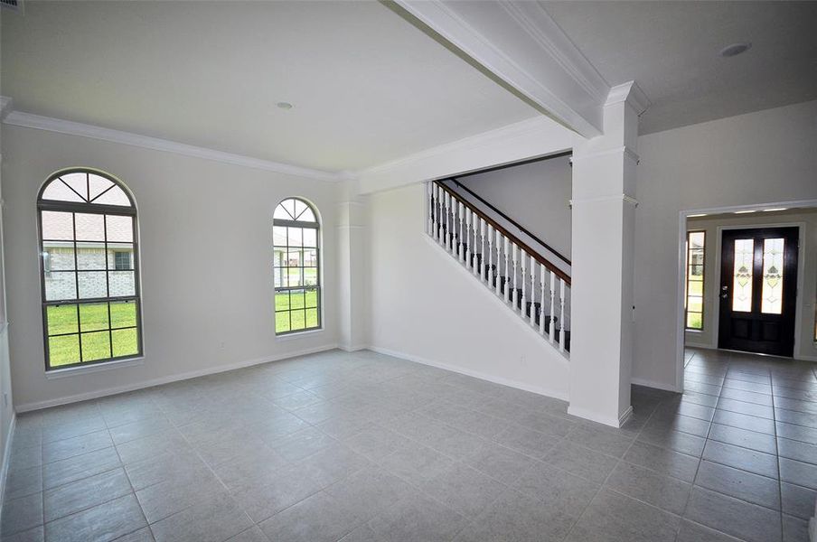 View across Dining Room to the staircase to the second floor.