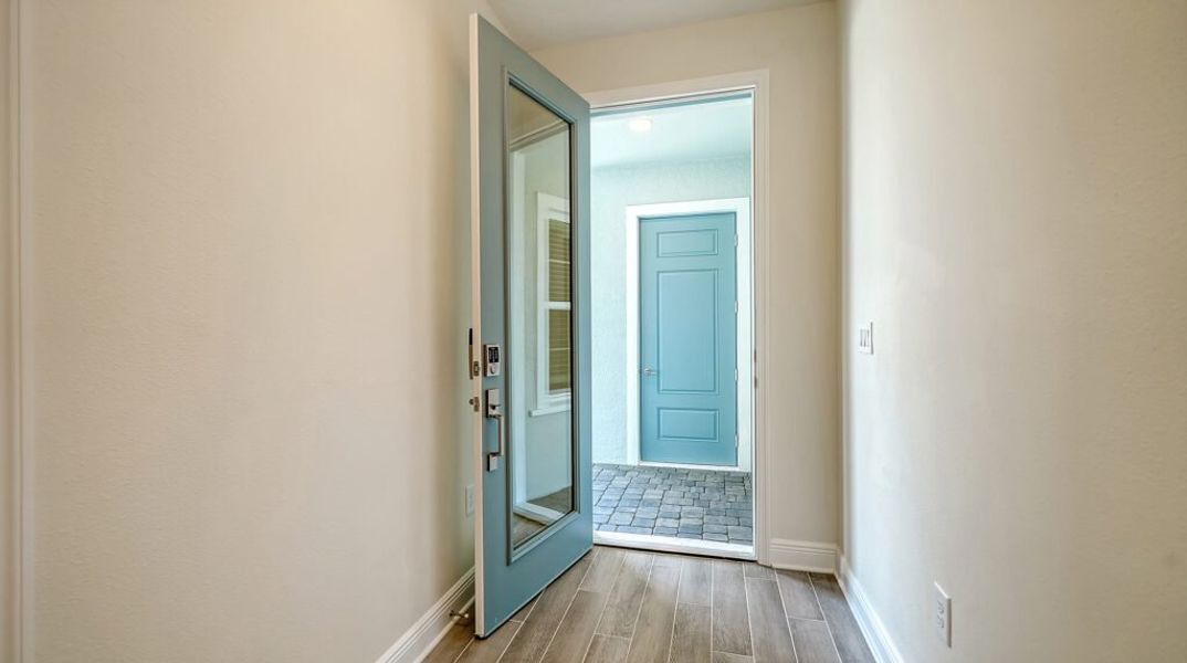 Spacious, unfurnished interior of a new home in Windward Real Estate and Homes for Sale in Sarasota, FL - Neal Communities, Lakewood Ranch (Image 32).
