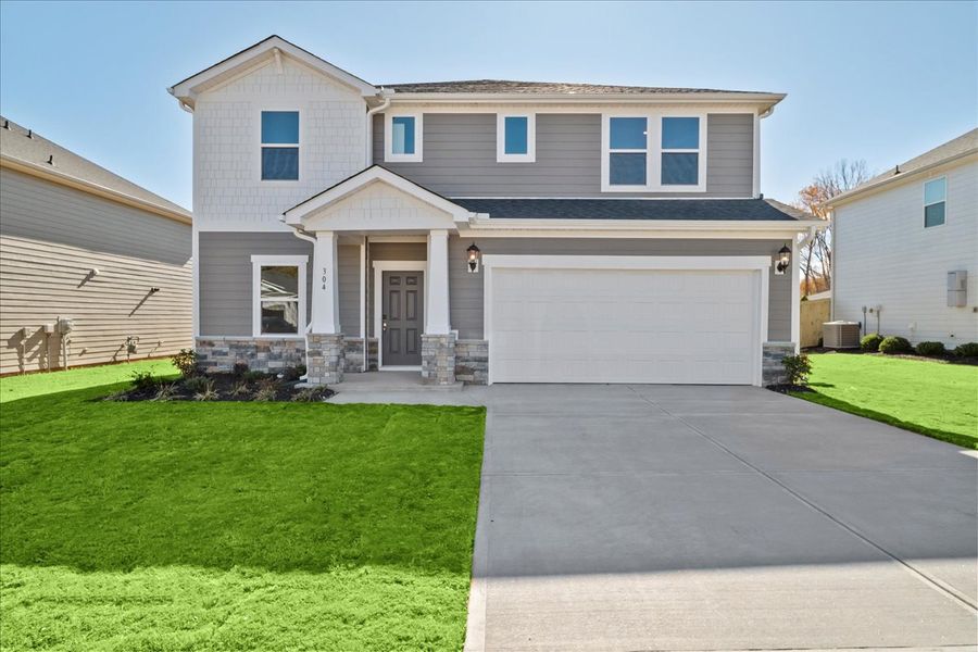 Front exterior of a new home in Reserve at Arden Woods, Greenville, SC, highlighting curb appeal (Image 1).