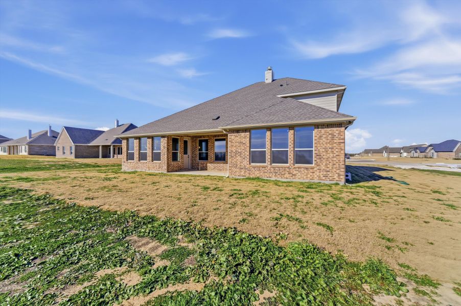 Exterior details and patio area of a home in Fannin Ranch, Leonard (Image 22).