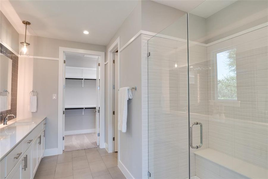 Martin Primary Bathroom.This home is under construction, and this photo is of a similar home, but the finishes may differ.