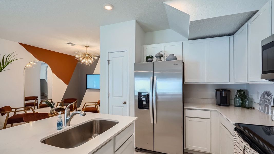 Furnished interior view inside a new home in Ashwood Cove, Lake Worth (Image 9).