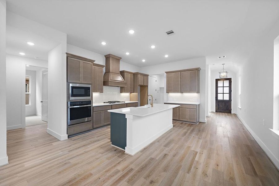 Representative furnished interior of a home built from the Cardinal by Caldwell Homes in Chambers Creek, Willis (Image 7).