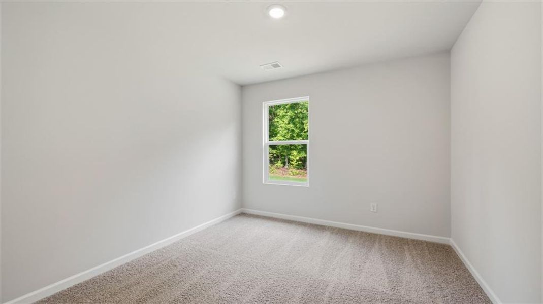 Spacious, unfurnished interior of a new home in Brookland Commons, Monroe (Image 24).
