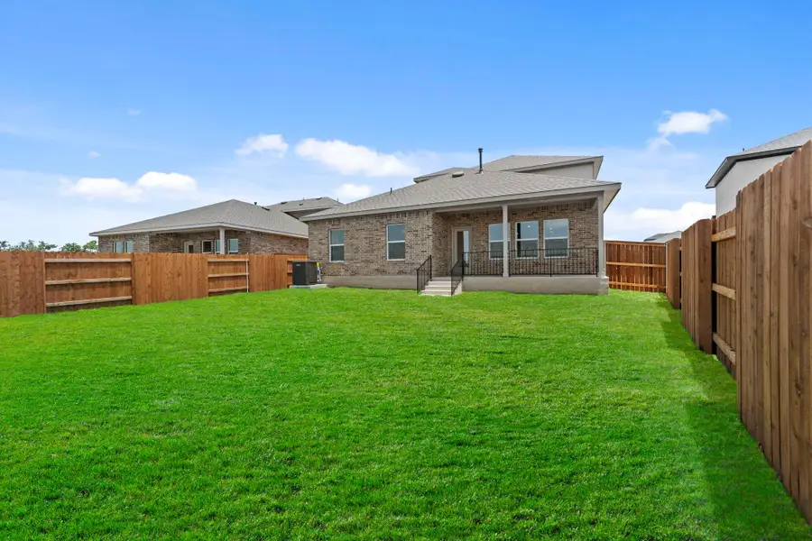 Exterior details and patio area of a home in Palomino, Manor (Image 3).